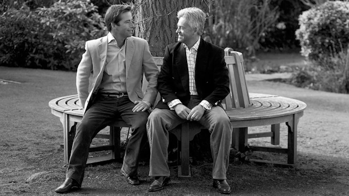 Two men sitting on a bench